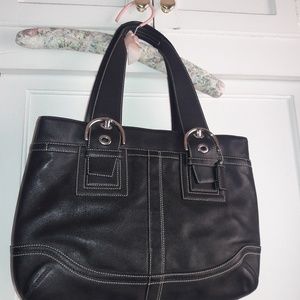 Large black leather Coach tote.